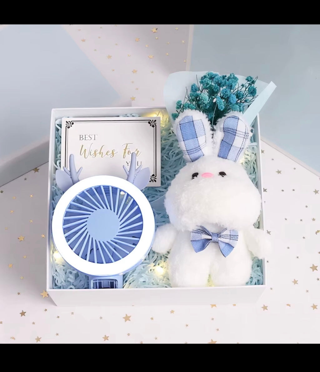 Blue bunny and mini fan gift box with flowers and greeting card