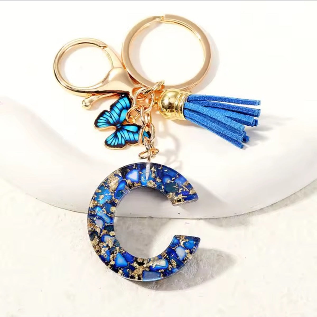 Blue butterfly tassel initial keychain letter C