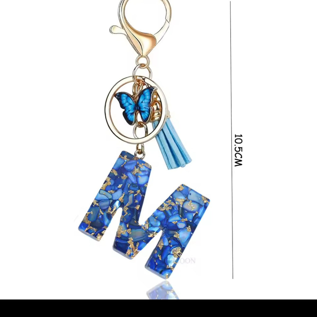 Blue butterfly tassel initial keychain size reference approximately 10.5 cm