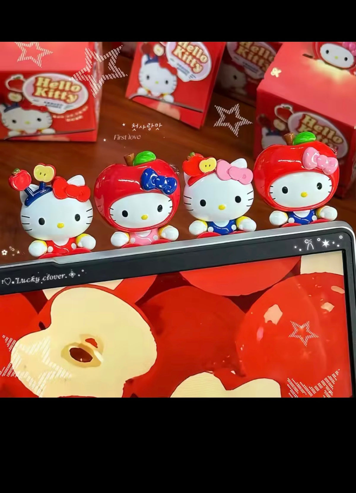 Hello Kitty Apple Party collectible figures displayed together