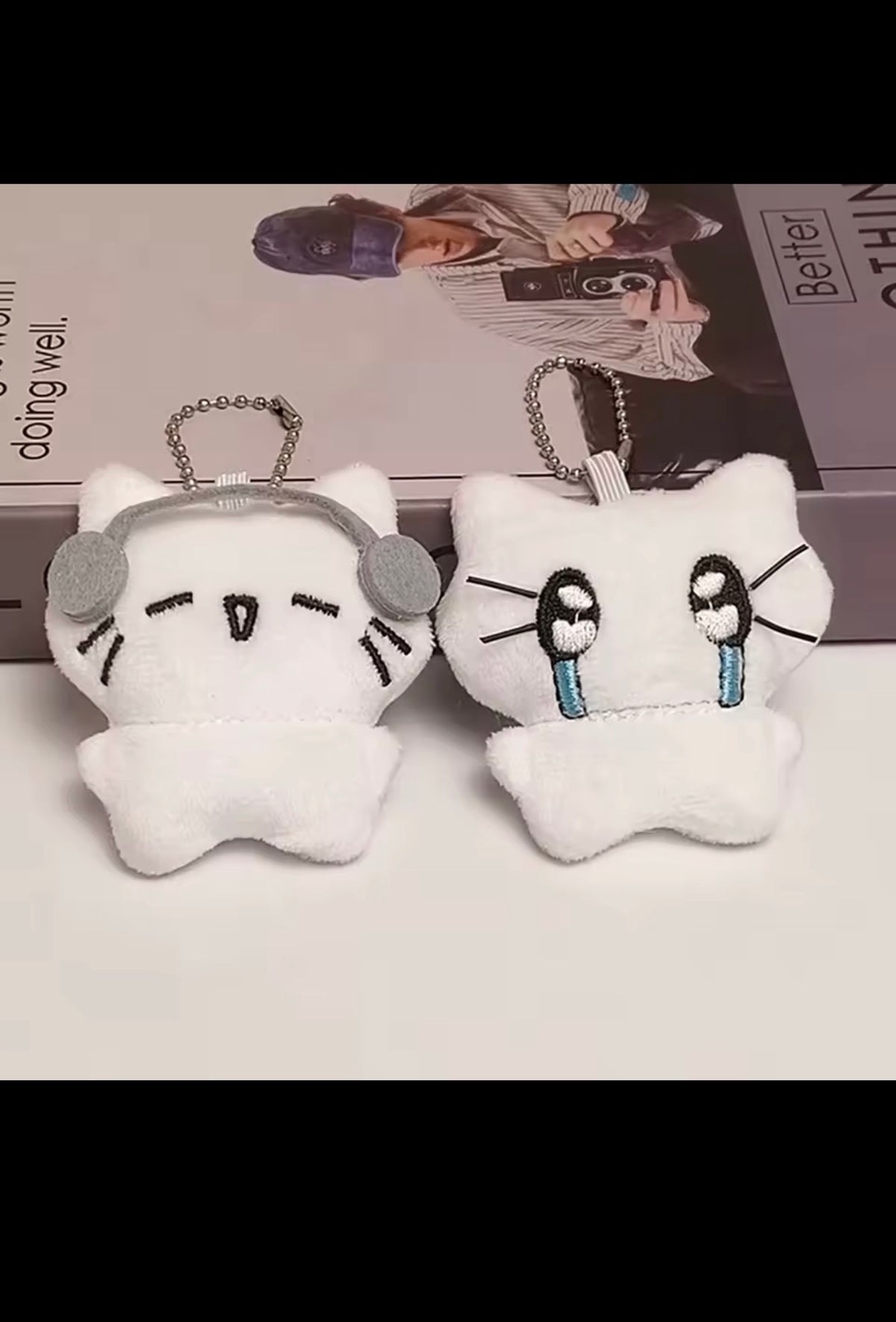 Headphone and teary-eyes kitten plush keychains