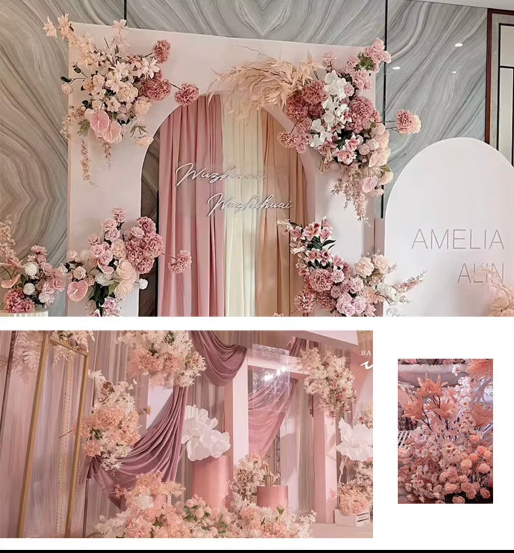 Pink artificial floral wedding backdrop and venue decor