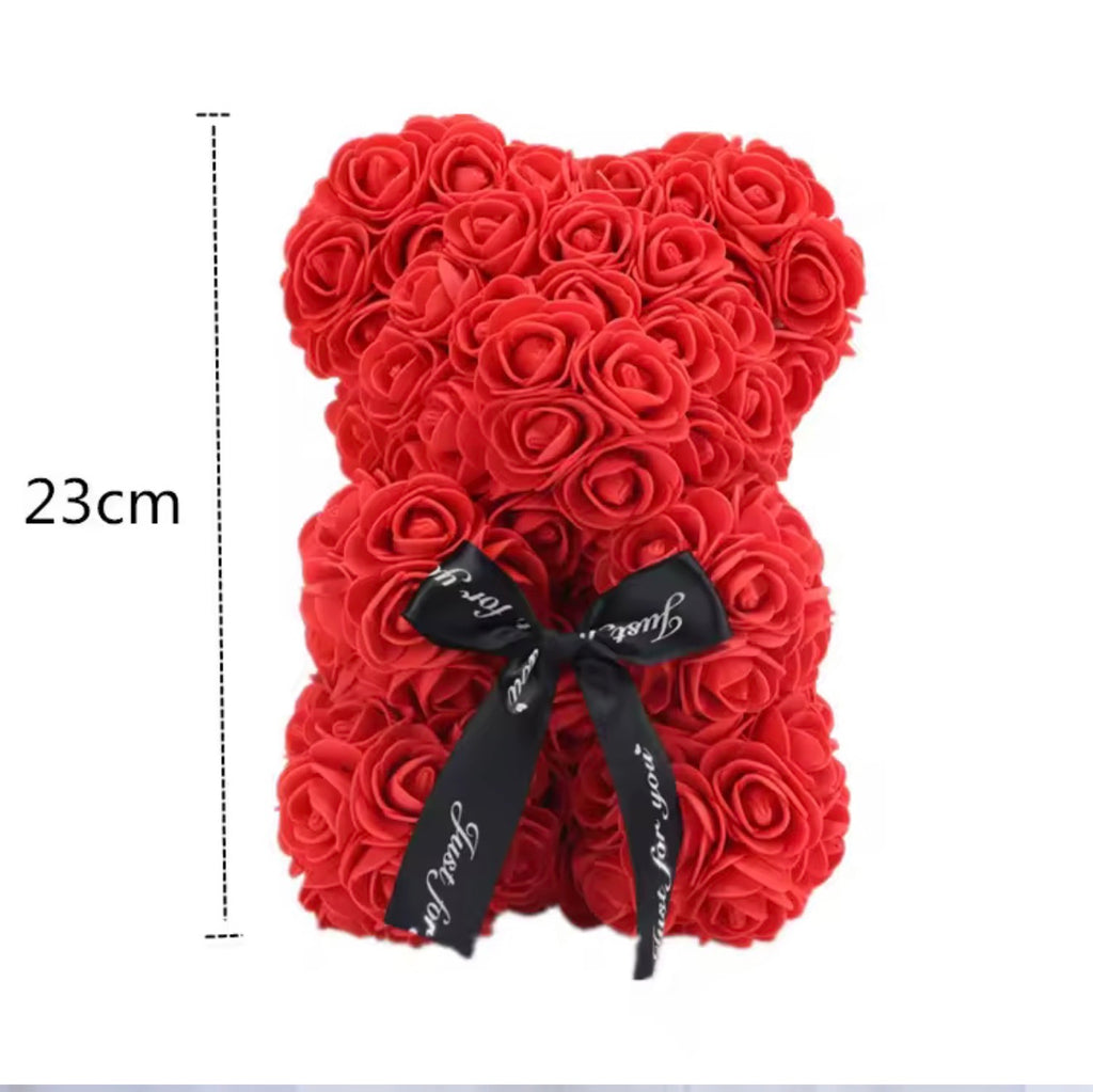 Red rose teddy bear with approximately 23 cm height shown