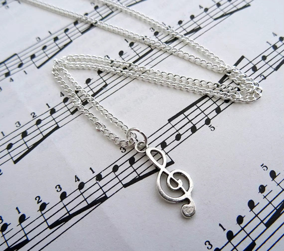 Treble clef music note necklace